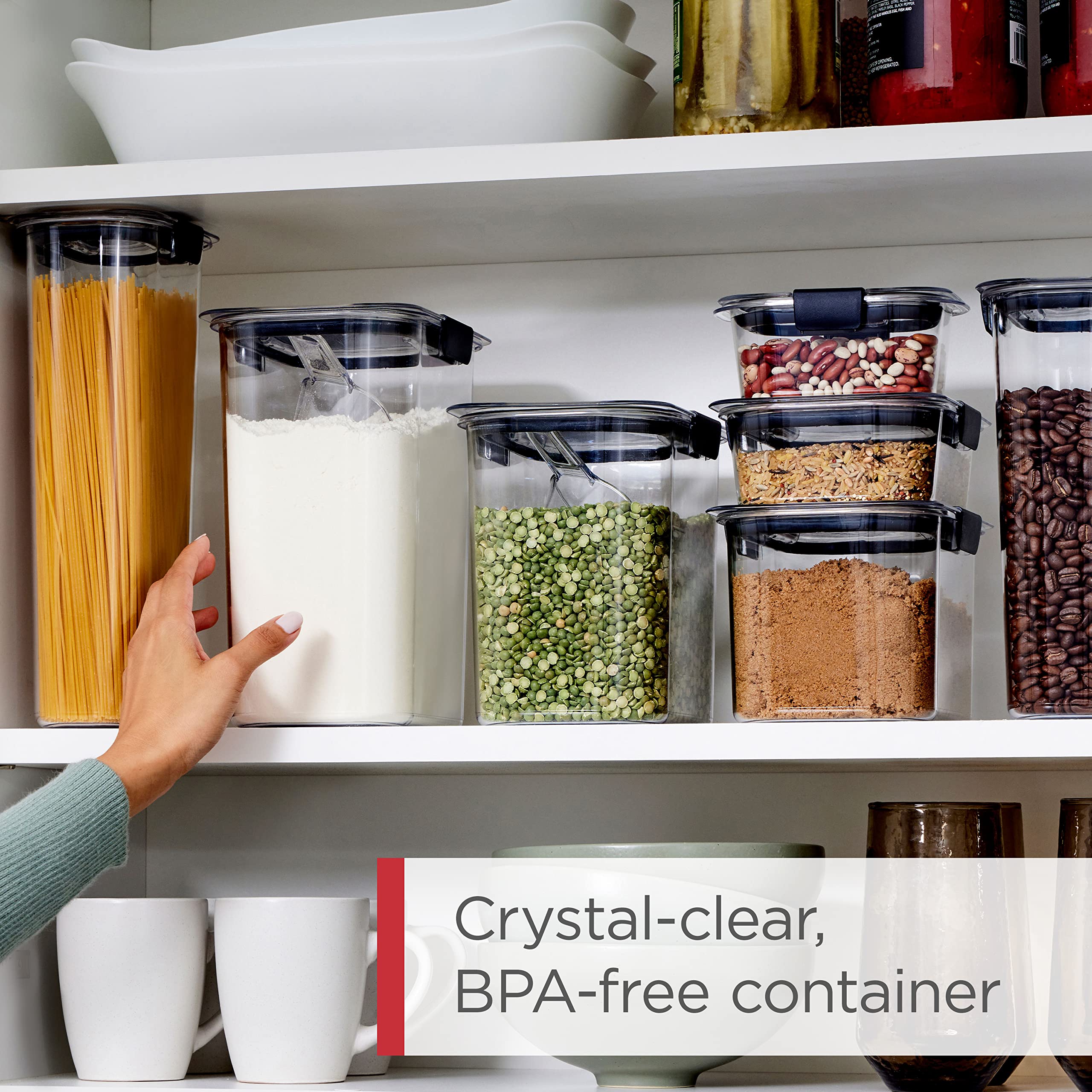 Rubbermaid Brilliance 0.5-cup scoop beside a small container for precise measuring convenience