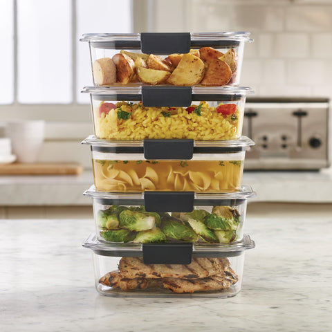 Rubbermaid Brilliance next to a hand and phone for scale showing compact portability benefit
