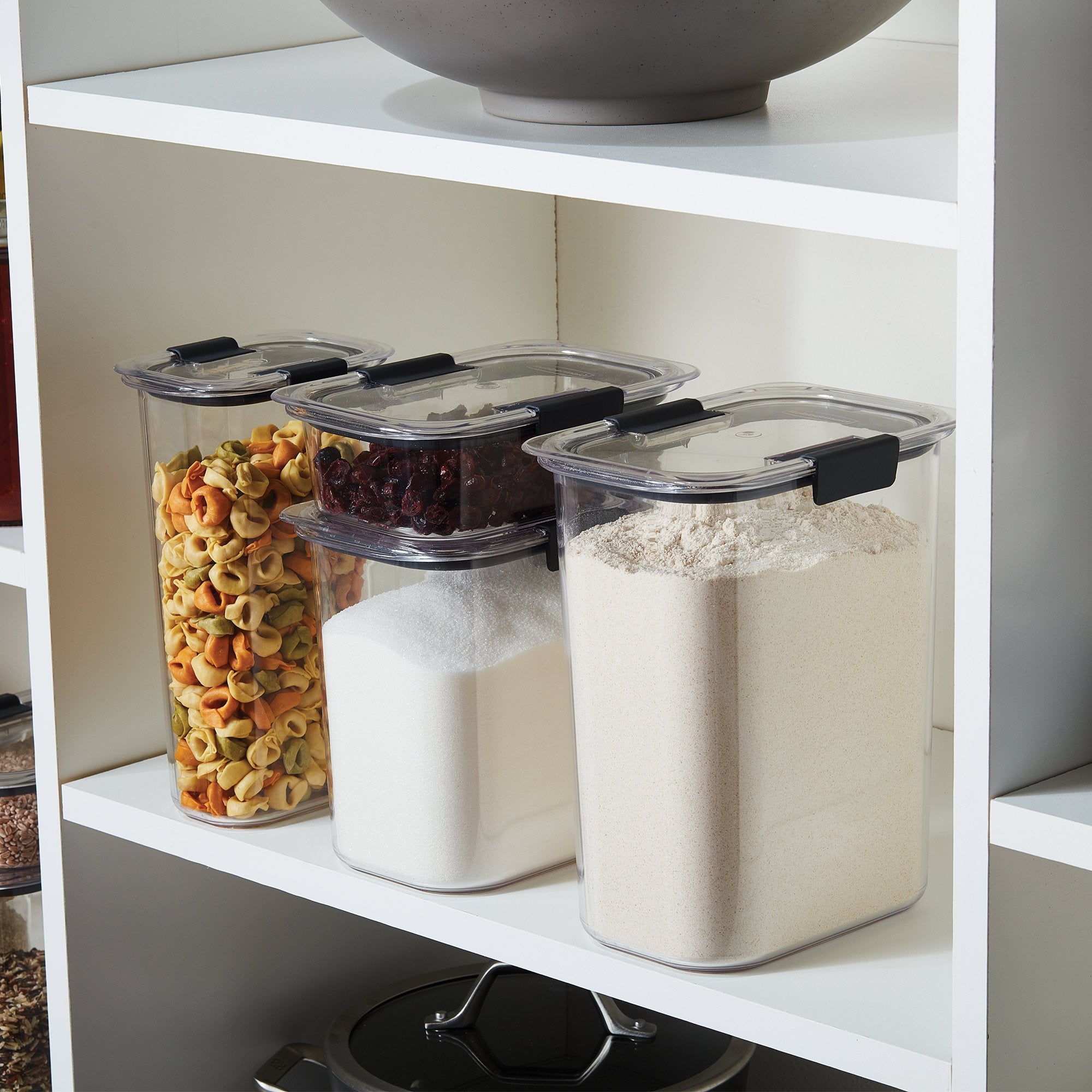 Rubbermaid stacked containers in pantry illustrating space-saving vertical organization