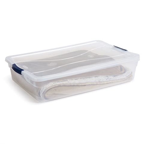 Rubbermaid bin slid under a bed illustrating low-profile fit benefit