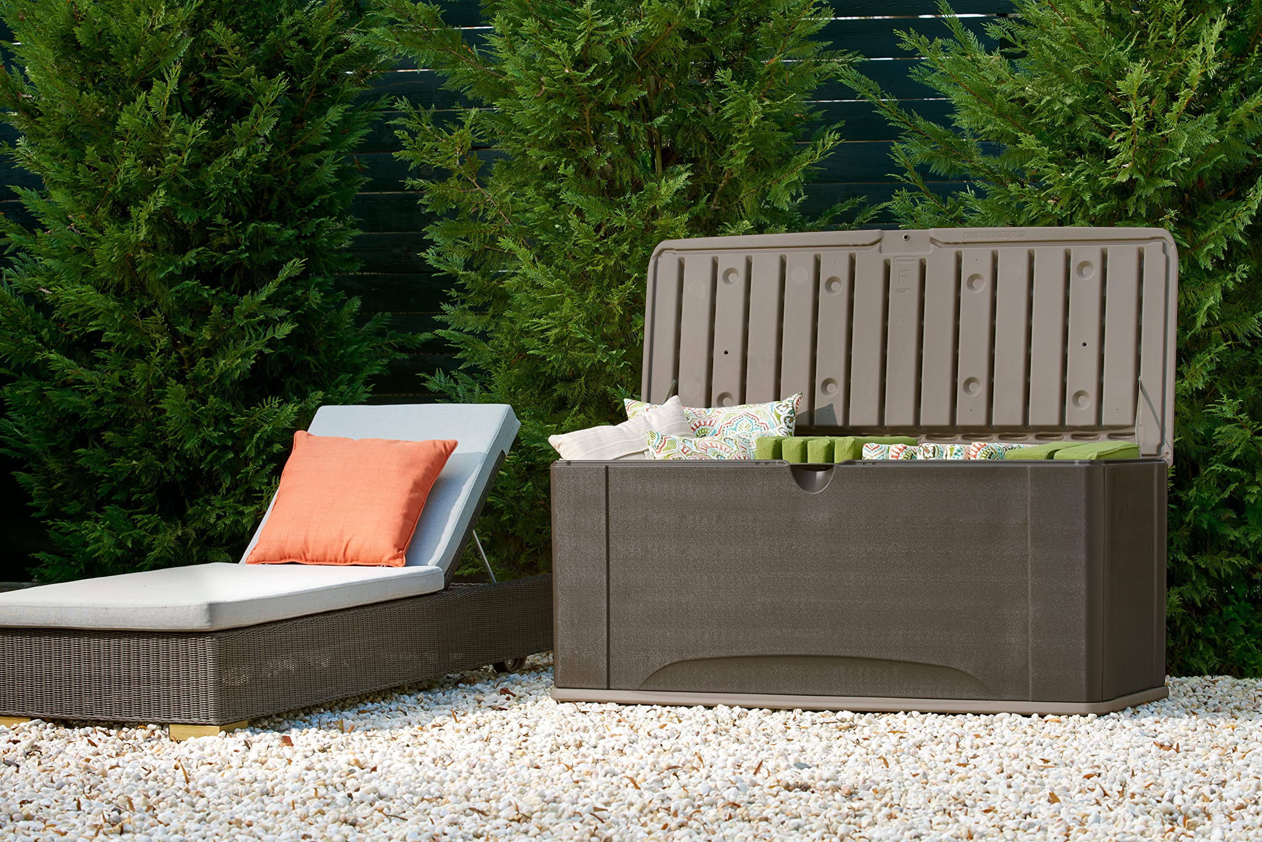 Rubbermaid deck box next to chair showing size and scale for planning
