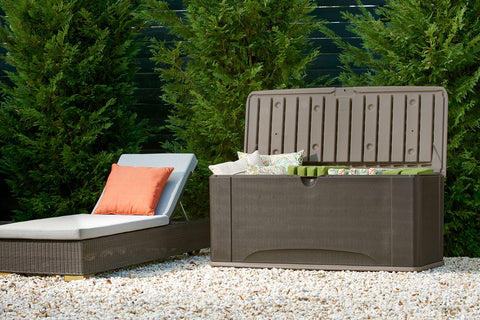 Rubbermaid deck box next to chair showing size and scale for planning