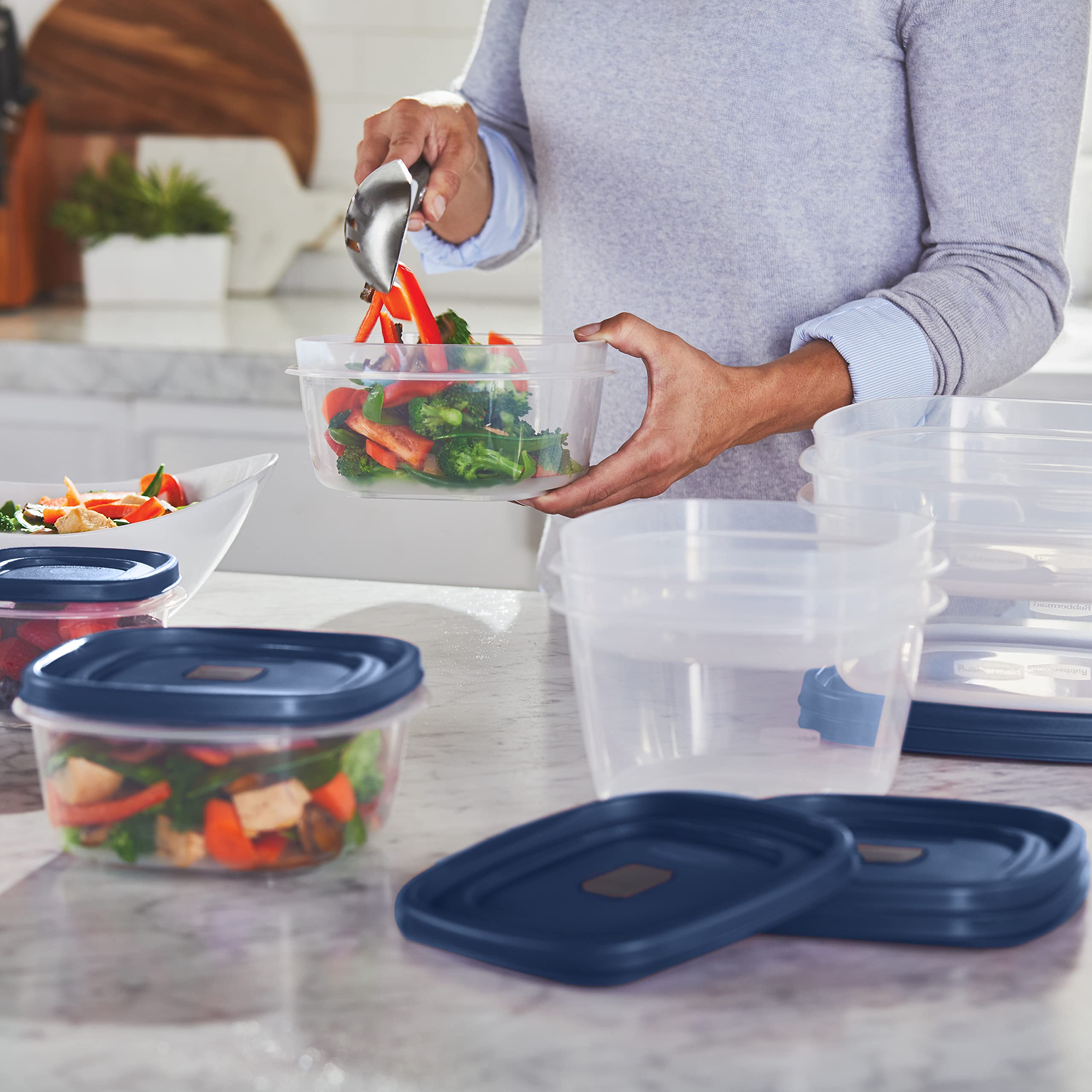 Rubbermaid containers lined up to show included sizes for meal prep and portioning