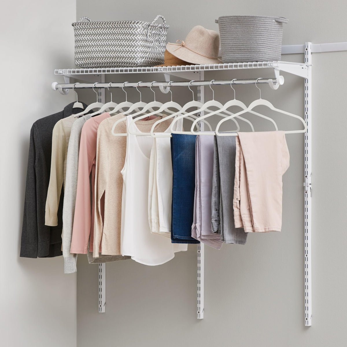 Rubbermaid front packaging of the 2–4 ft closet kit showing contents and benefit of organized storage