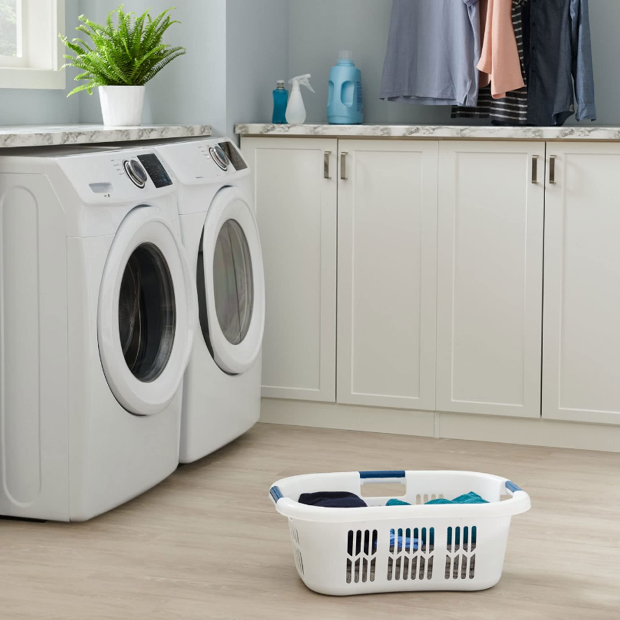 Rubbermaid in bathroom holding towels to show practical household use