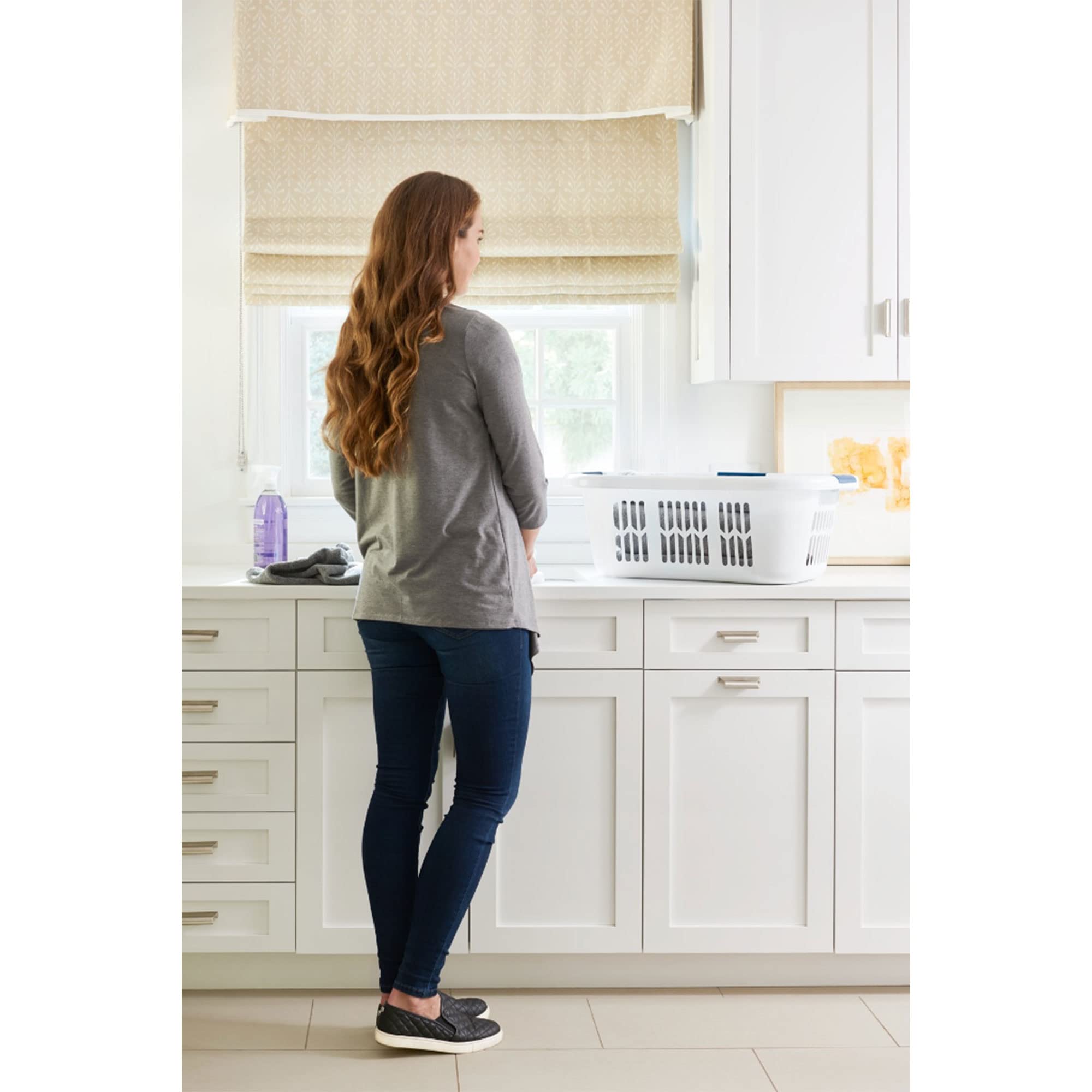 Rubbermaid on closet shelf to show compact storage and space-saving benefit
