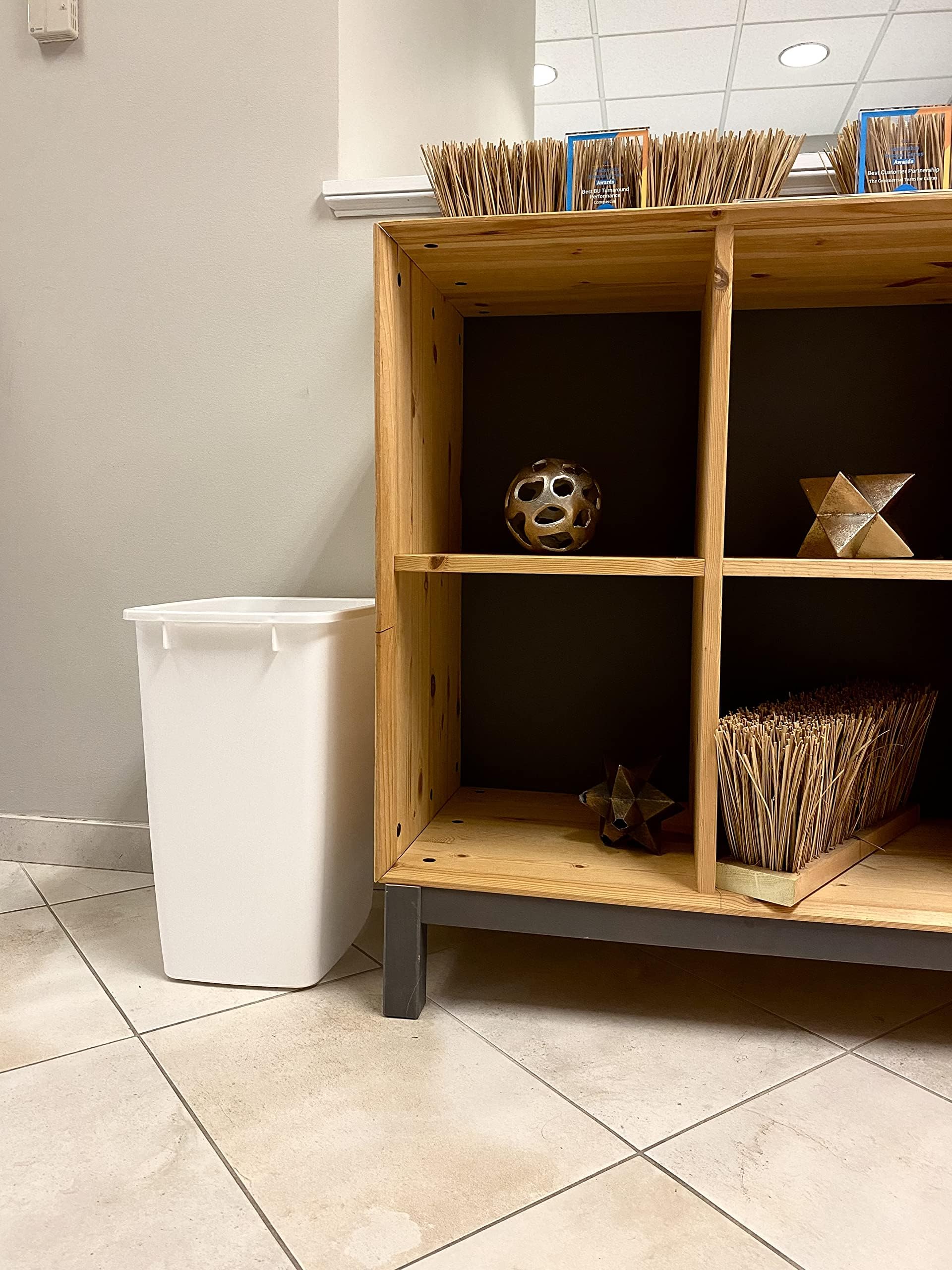 Rubbermaid in bathroom setting showing discreet look and tidy waste handling