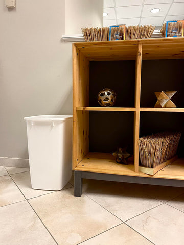 Rubbermaid in bathroom setting showing discreet look and tidy waste handling