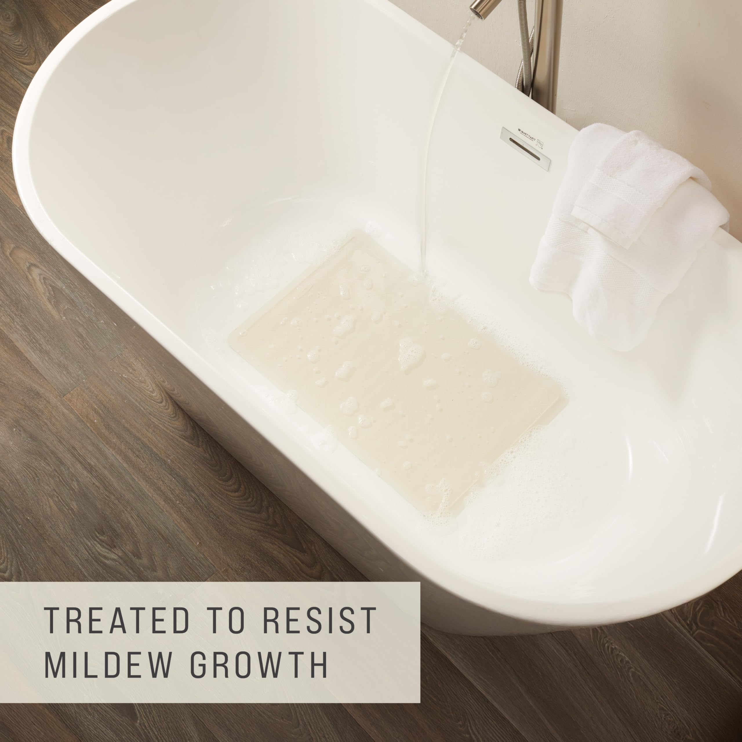 Rubbermaid Safti-Grip staged in hotel shower conveys commercial-grade safety and cleanliness