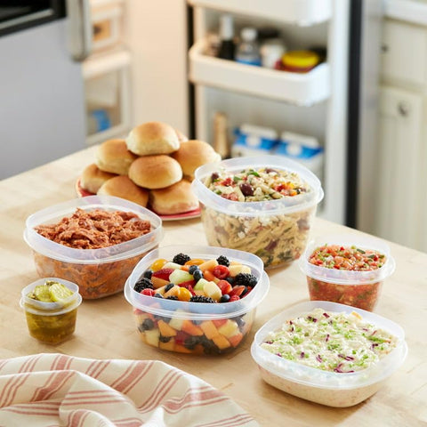 Rubbermaid container held in hand showing 14-cup capacity and scale benefit