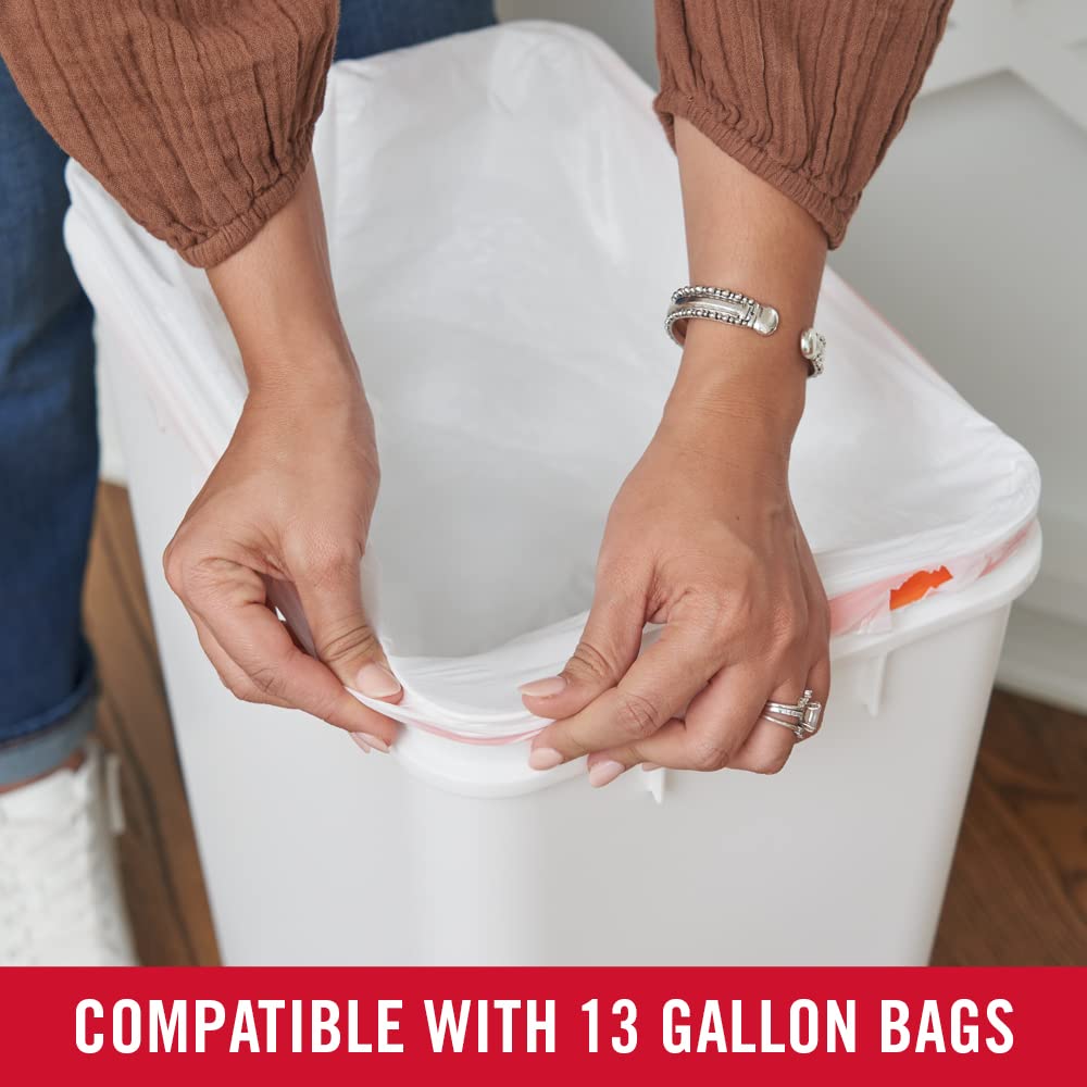Rubbermaid next to cabinet for scale showing 12.2 gallon capacity fit