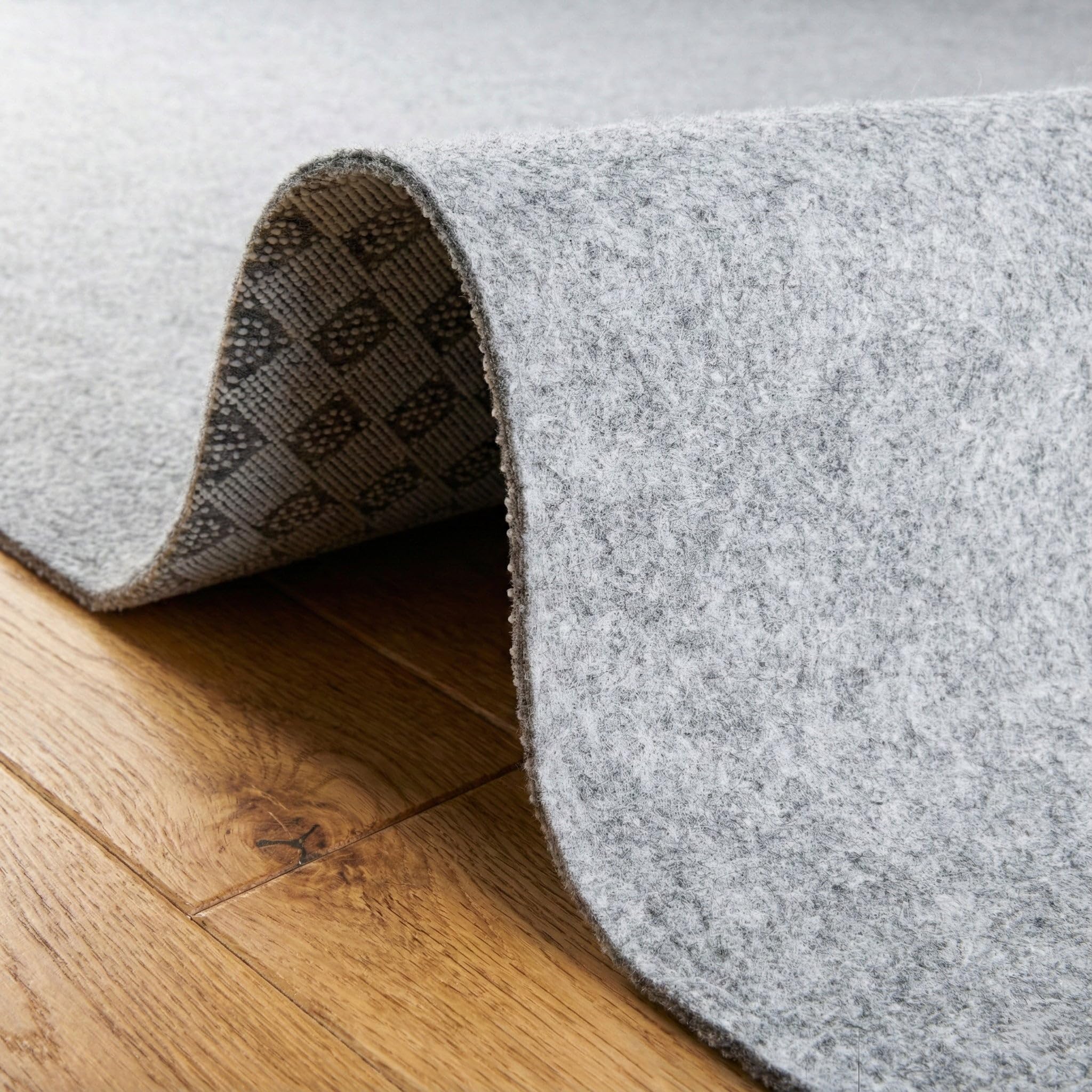 Rugs.com corner close-up showing stable edges and no curl