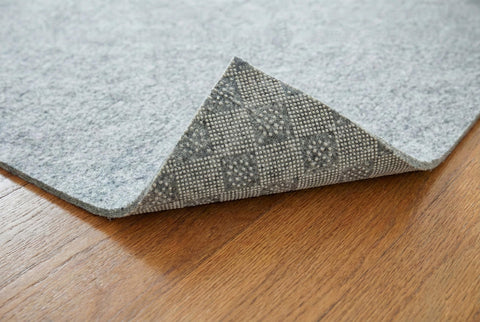 Rugs.com pad in living room enhances comfort and reduces noise