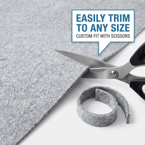 Rugs.com pad under rug showing correct scale and secure placement