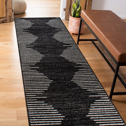 Rugshop front view of black bohemian stripe runner showing bold pattern and balance