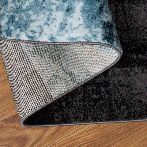 Rugshop rug styled under a coffee table adding warmth to seating area