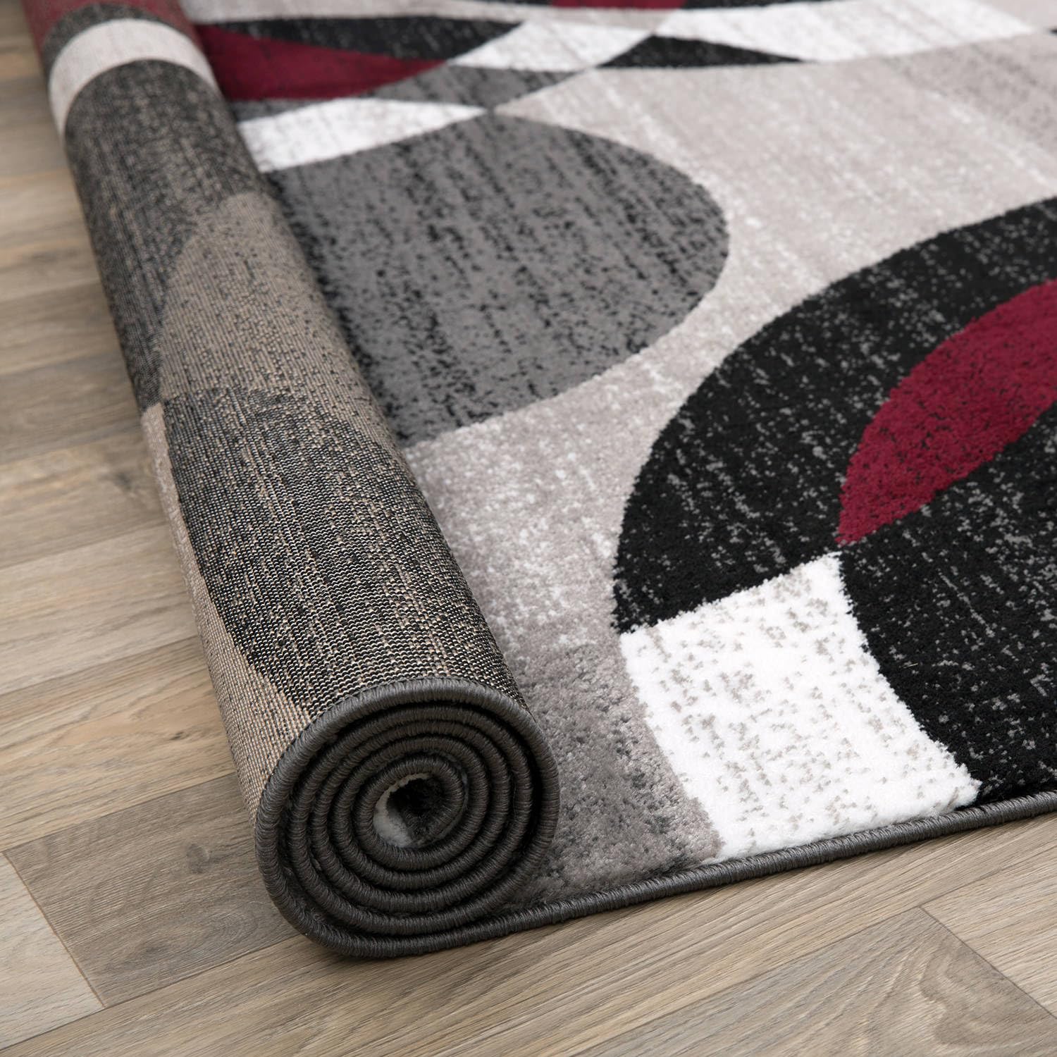 Rugshop rug placed under sofa demonstrating low 0.39-inch pile and door clearance