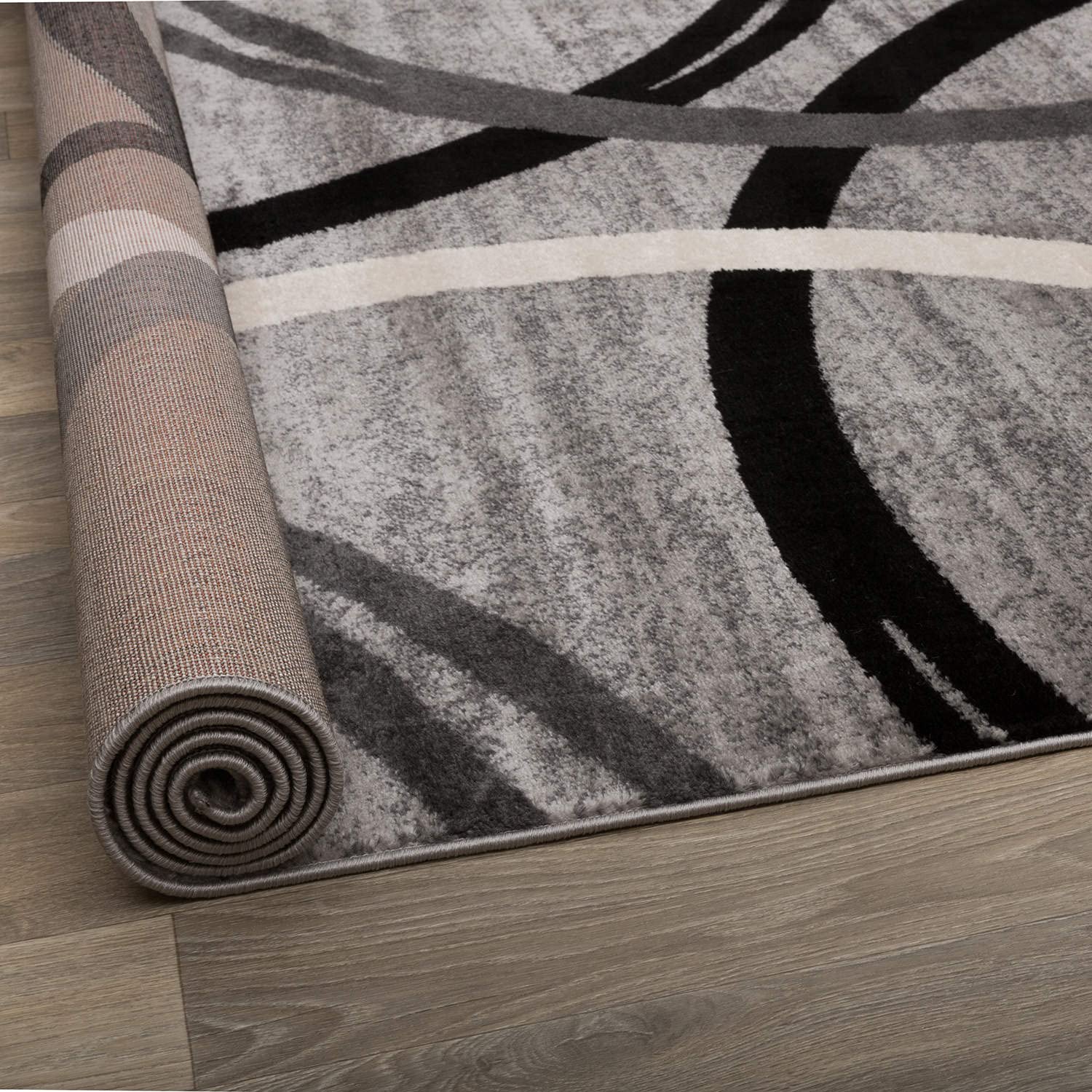 Rugshop rug laid in a living room providing a modern focal point