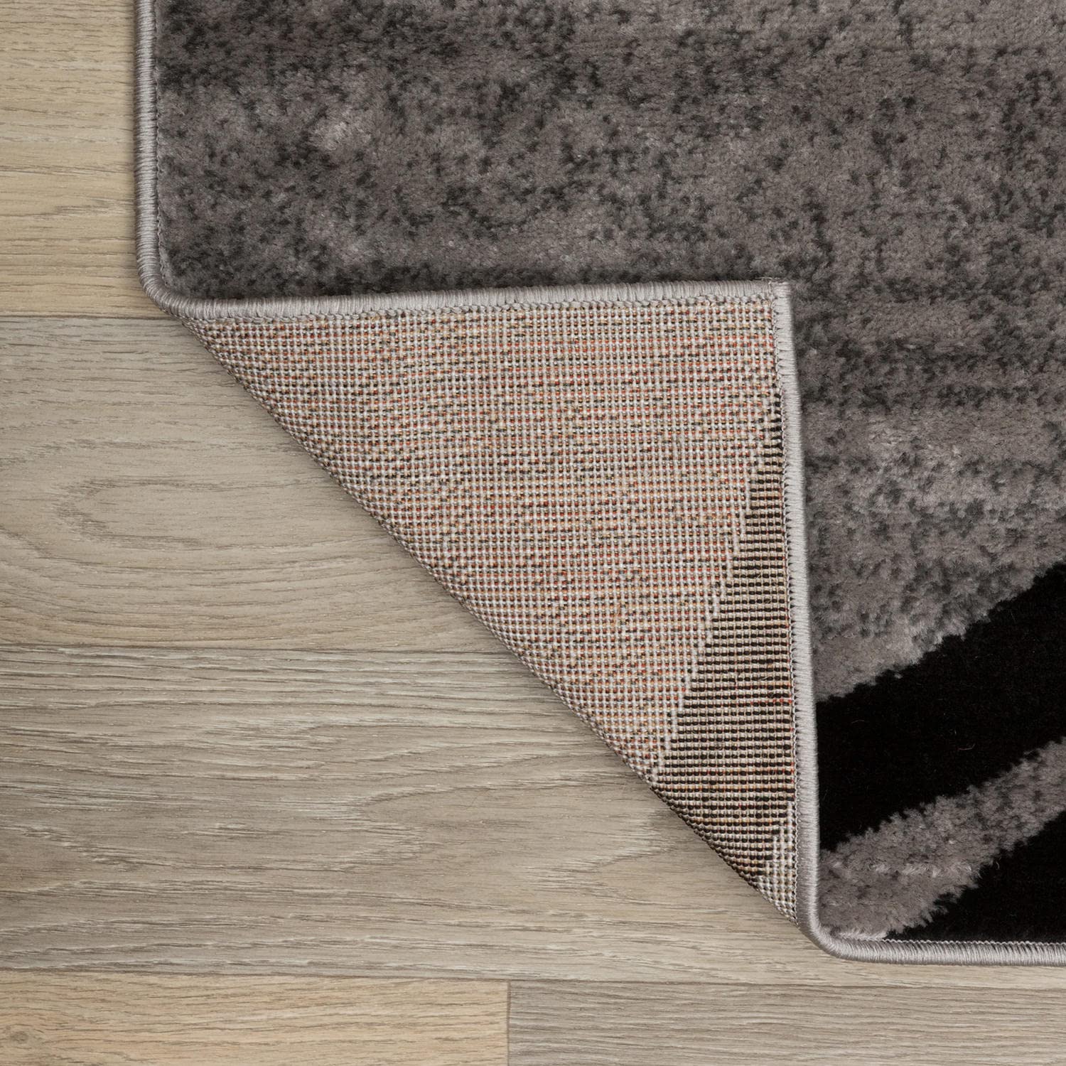Rugshop rug under dining table illustrating stain-resistant and practical use