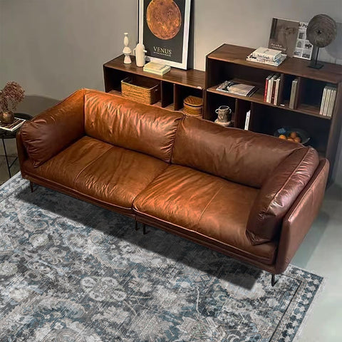 RUGSURE beside chair for scale, shows compact 3x5 fit and versatility