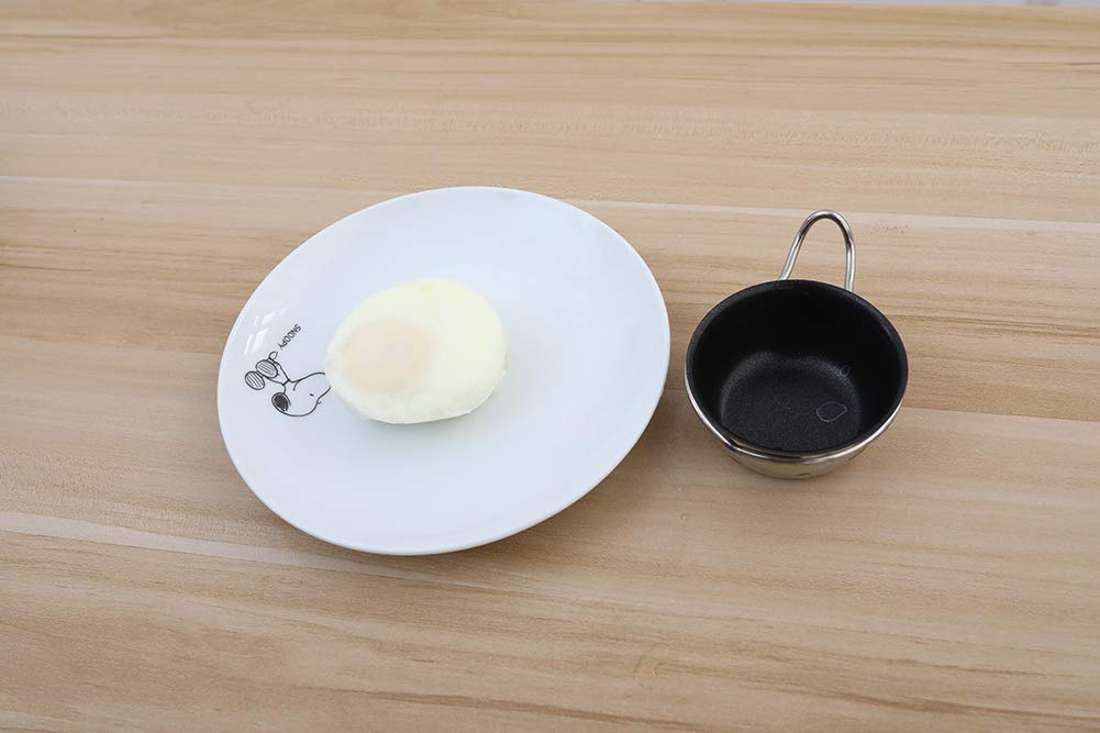 RUNZI egg poacher filled with six perfectly poached eggs showcasing uniform shape and presentation