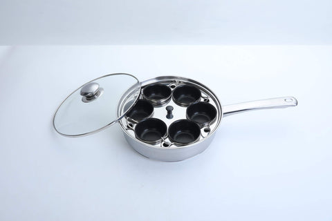 RUNZI pan beside hand for scale showing large 75ml cups and capacity benefit