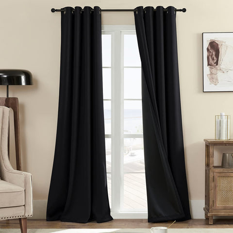 Rutterllow front view of both blackout curtain panels showing full coverage and neat hang
