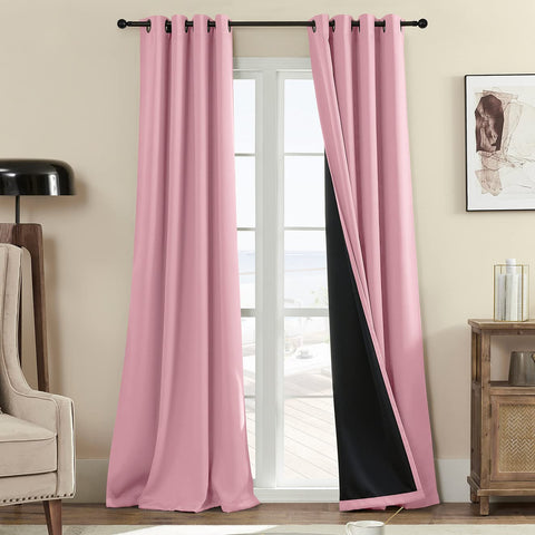 Rutterllow front view of both panels showing full blackout coverage and classic drape