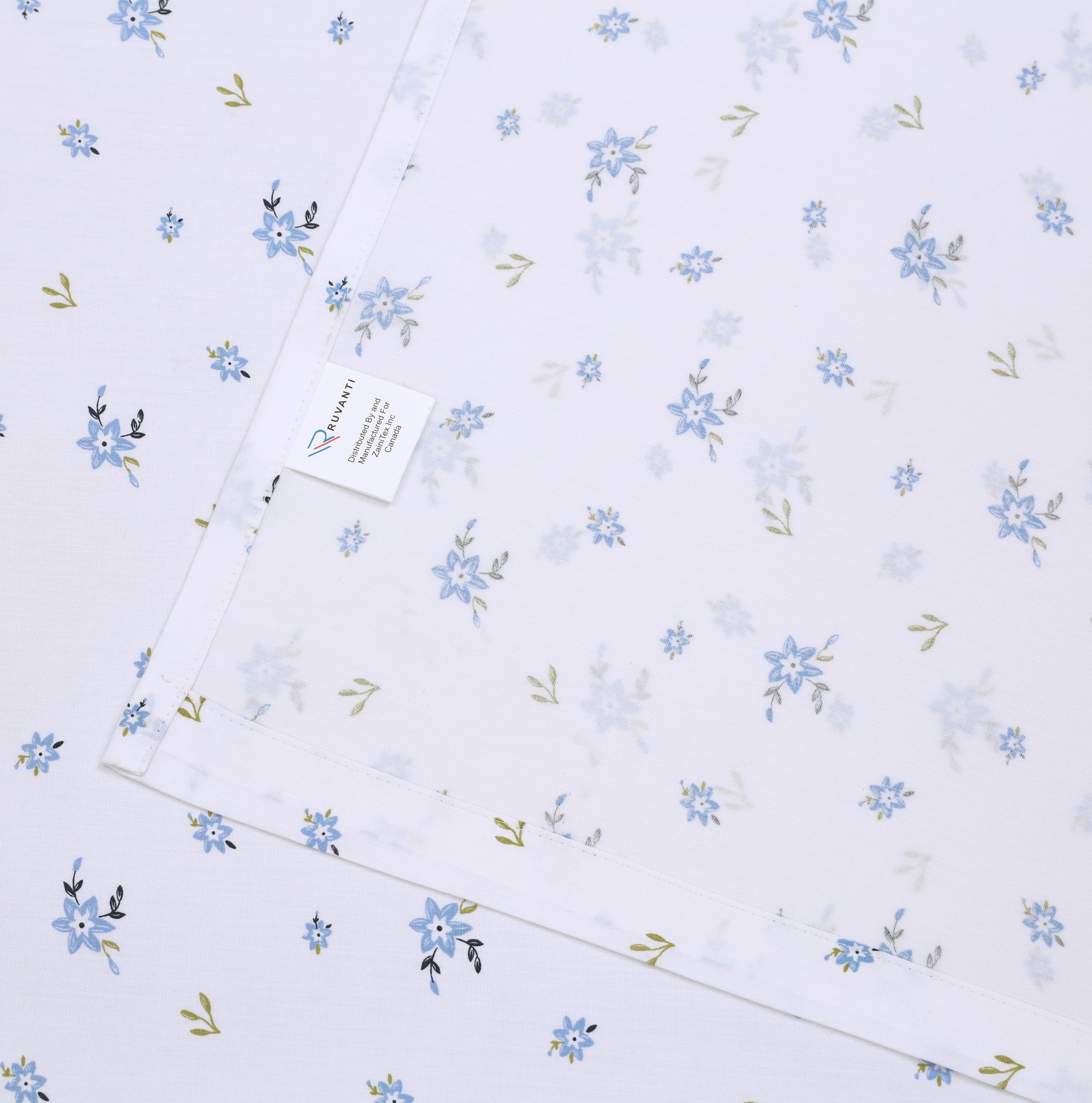 RUVANTI flat sheet spread to show full coverage and crisp drape