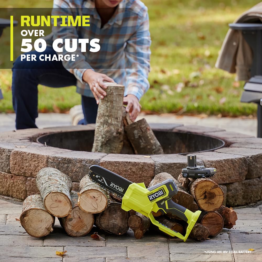 RYOBI chainsaw held in hand for size comparison showing lightweight control