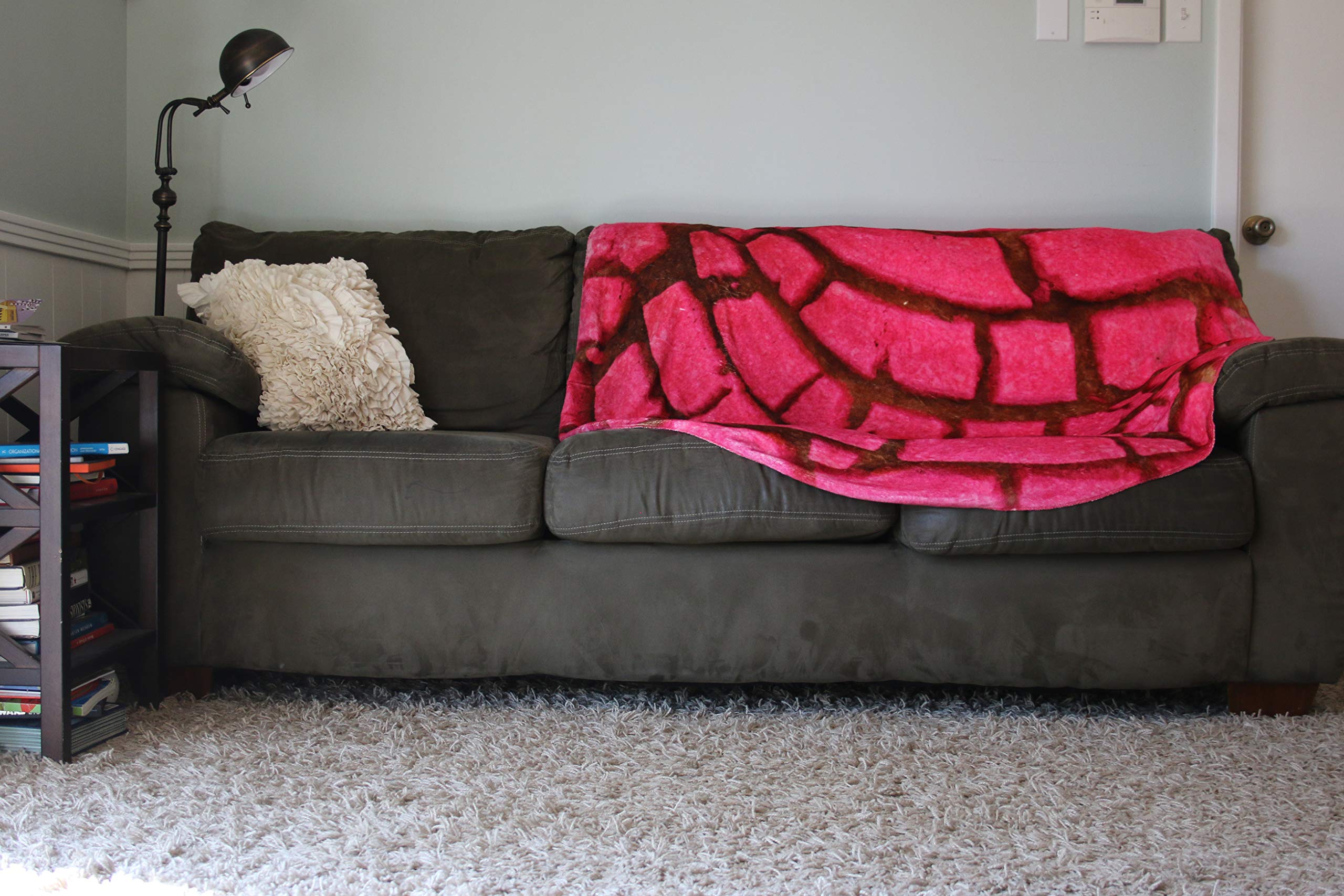 SA Flavor concha blanket on picnic setup offering portable comfort and colorful charm