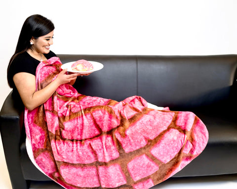 SA Flavor concha blanket wrapped around person providing warmth and fun novelty