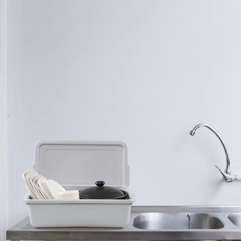 Saedy tub in sink with dishes illustrating efficient bussing and washing