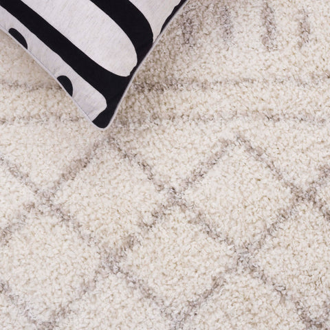 SAFAVIEH styled in living room to show neutral Moroccan-boho design benefits