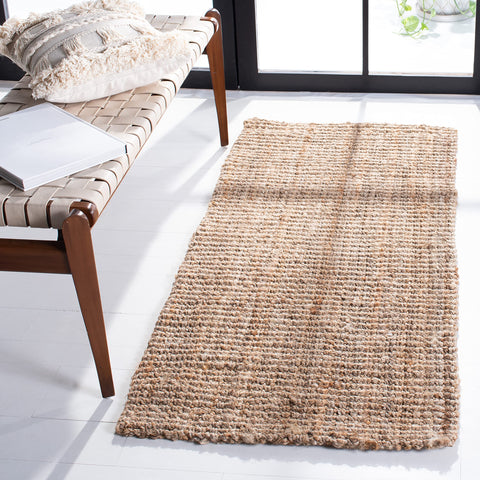 SAFAVIEH front view of jute rug showing neutral tone and entryway benefit