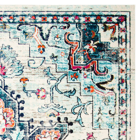 SAFAVIEH bedroom layout with rug demonstrates warmth and bedside definition benefit