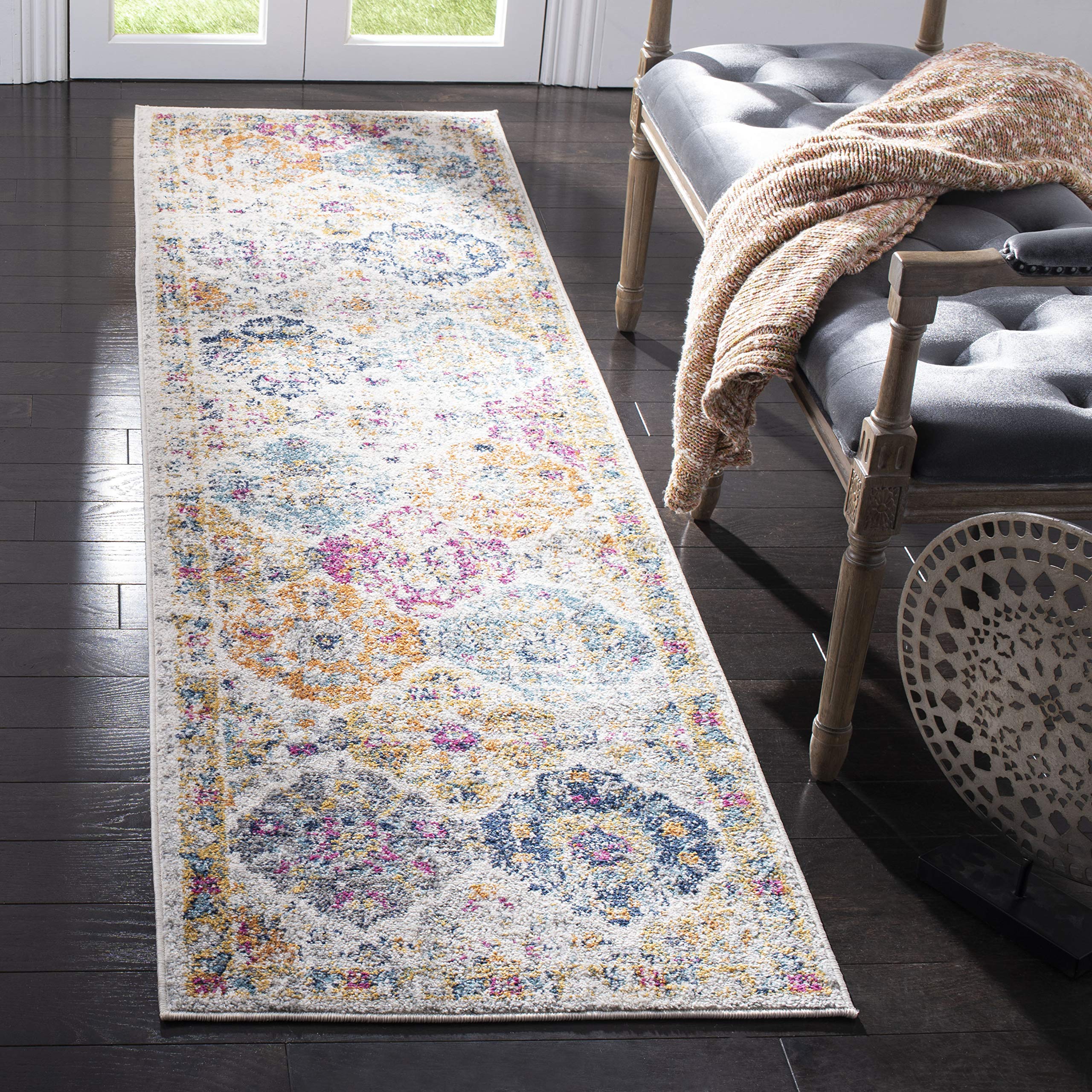 SAFAVIEH runner front view showing cream and multi medallions, enhances hallway style