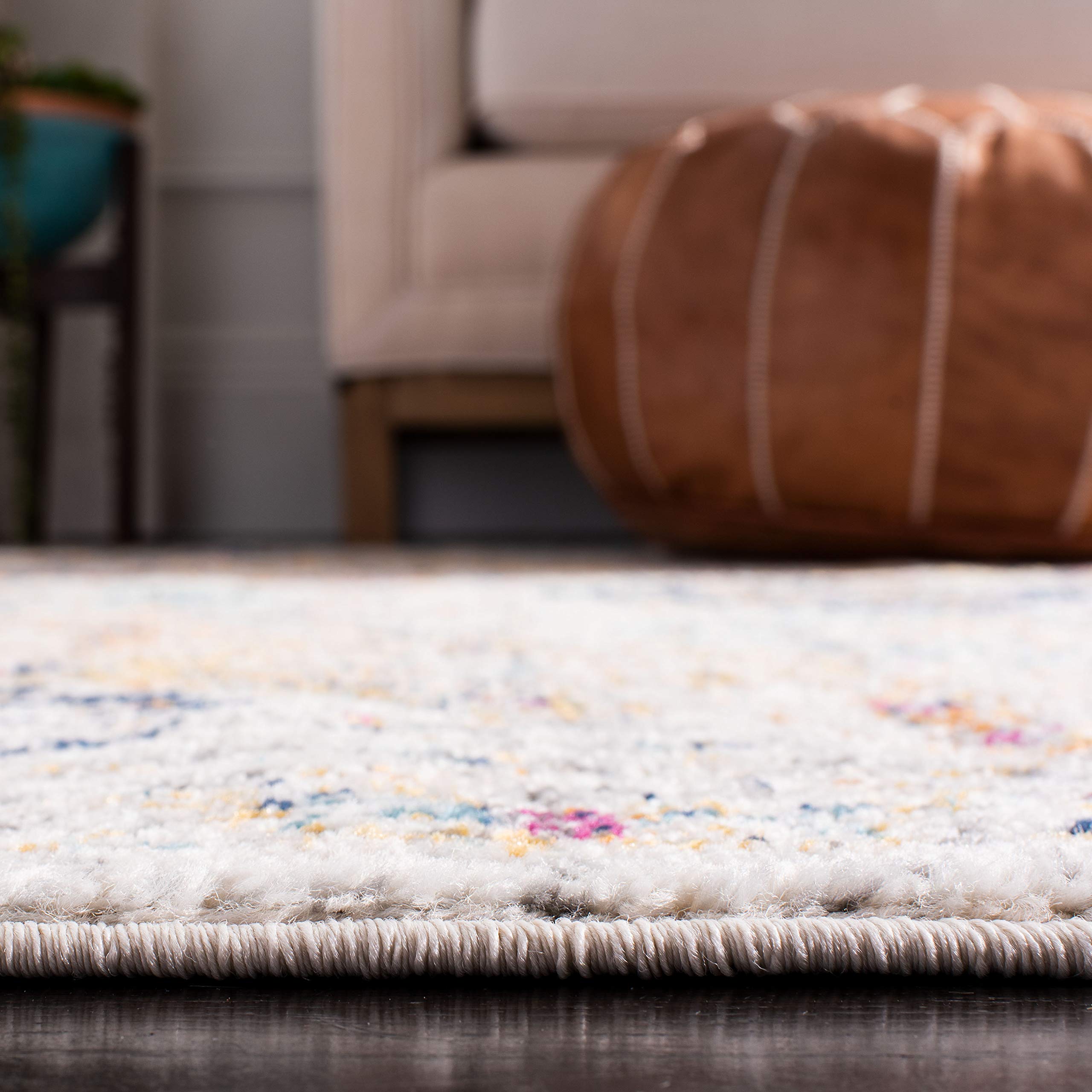 SAFAVIEH runner placed in a foyer, demonstrates scale and welcoming aesthetic