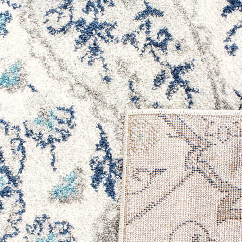 SAFAVIEH Madison woven backing and label closeup, indicates stable construction and longevity