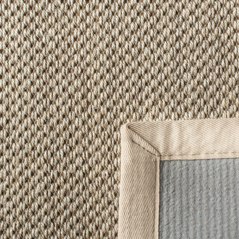 SAFAVIEH rolled rug in packaging demonstrating shipment condition and care tip