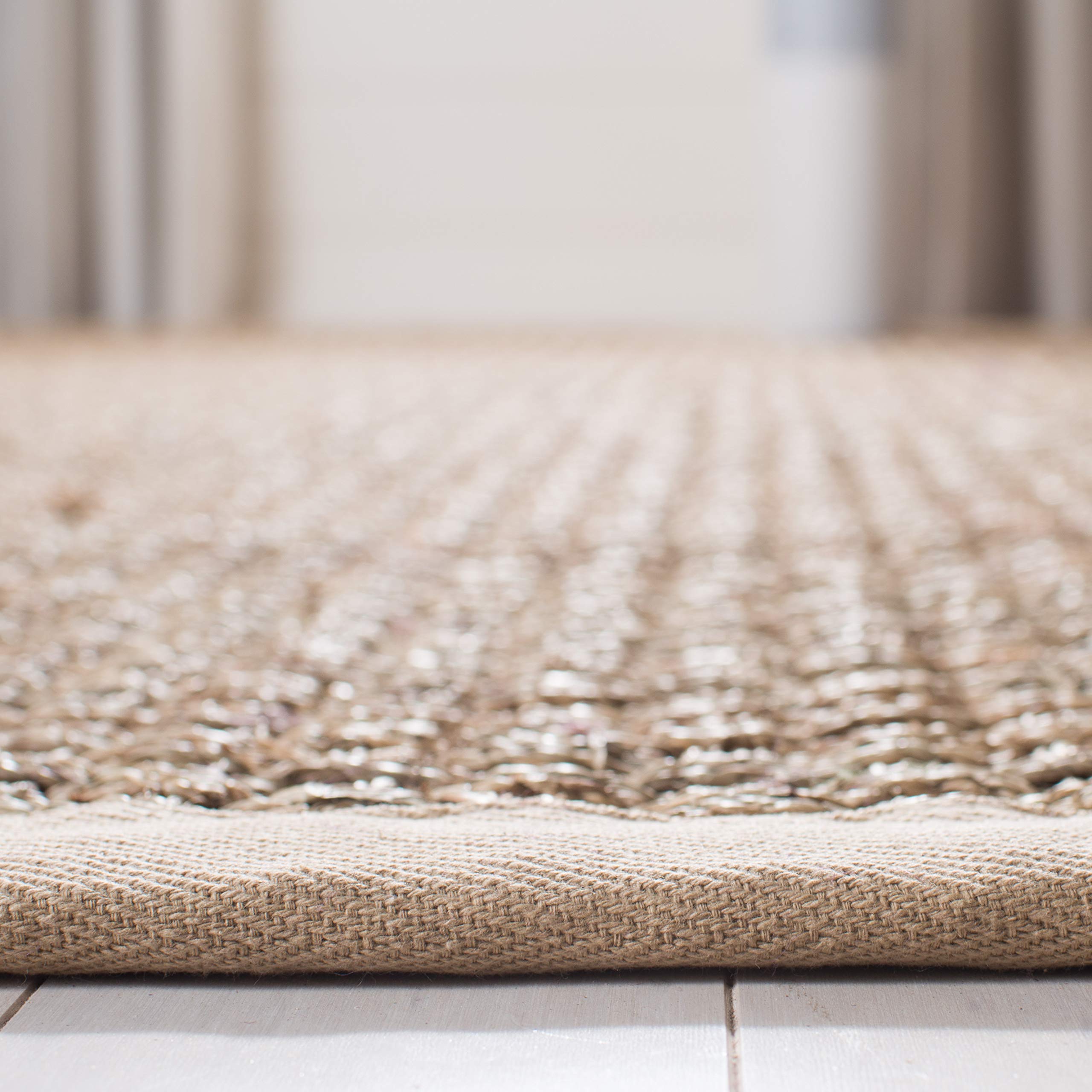 SAFAVIEH styled in an entryway demonstrating grounding effect and traffic durability