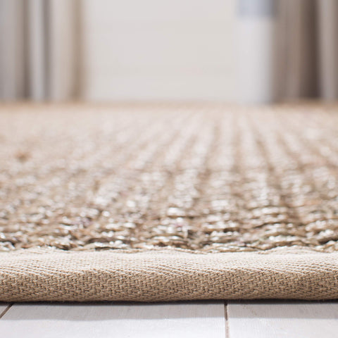 SAFAVIEH styled in an entryway demonstrating grounding effect and traffic durability
