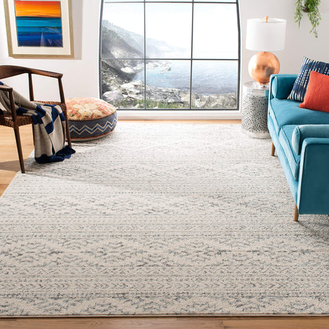 SAFAVIEH demonstration of rug pad under Tulum showing added grip and cushioning benefit