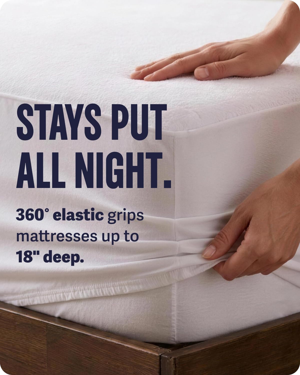 SafeRest protector on made bed showing clean look and everyday protection benefit