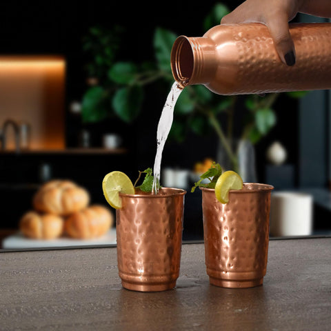 SAJTOX tumbler in hand showing 350ml size and portable convenience