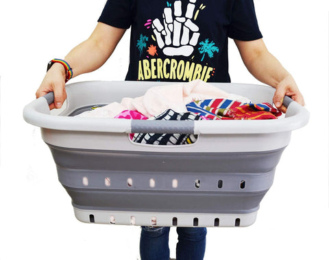 SAMMART basket used at the beach holding towels and toys for portable storage