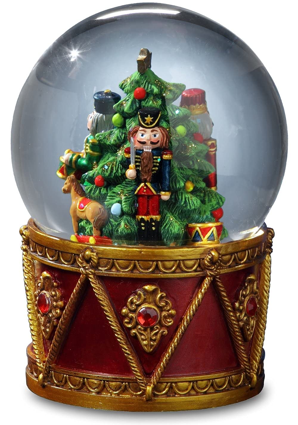 San Francisco Music Box Company globe in holiday scene on mantel, creating festive ambiance