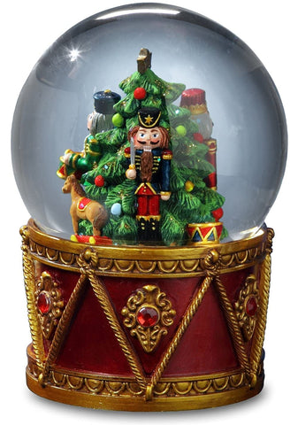 San Francisco Music Box Company globe in holiday scene on mantel, creating festive ambiance