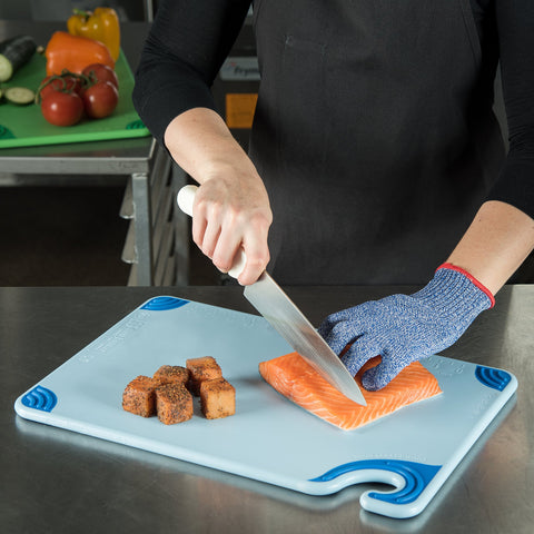 San Jamar cutting board in use with chef demonstrating stability and efficiency