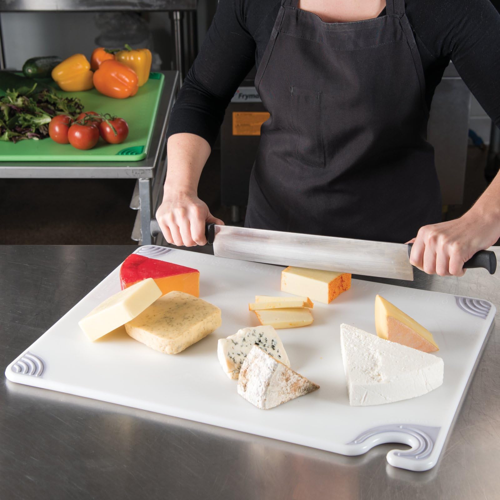 San Jamar board in use on busy kitchen counter improving prep efficiency